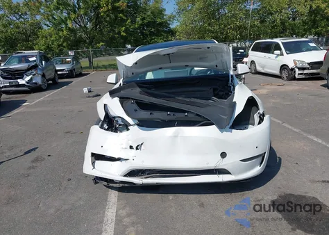 2022 Tesla Model Y Long Range Dual Motor All-Wheel Drive из США, поврежденный, VIN 7SAYGDEE6NF419749